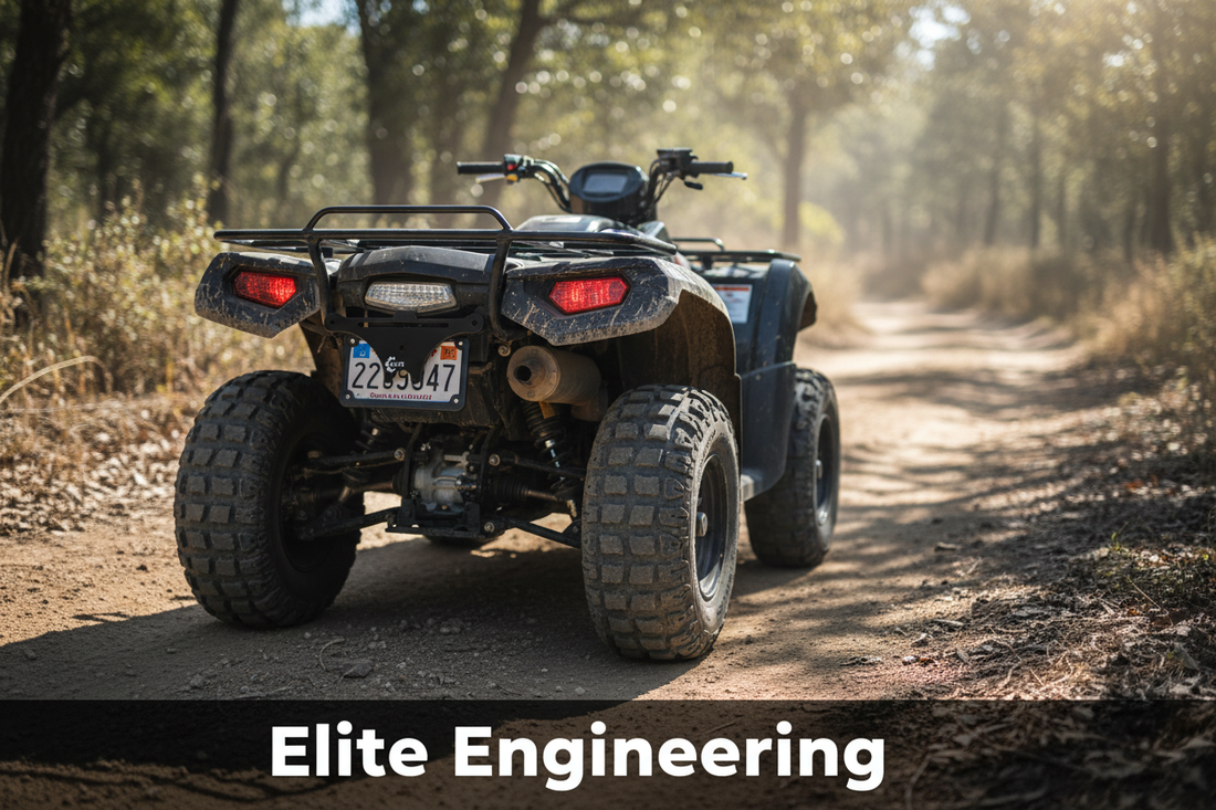 Rear view of an ATV on a dirt trail with a license plate clearly mounted on the upper rear frame away from the tires