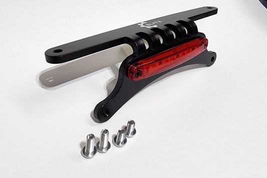 Black aluminum license plate mount bracket with red accents and an LED marker light, including hardware for installation.